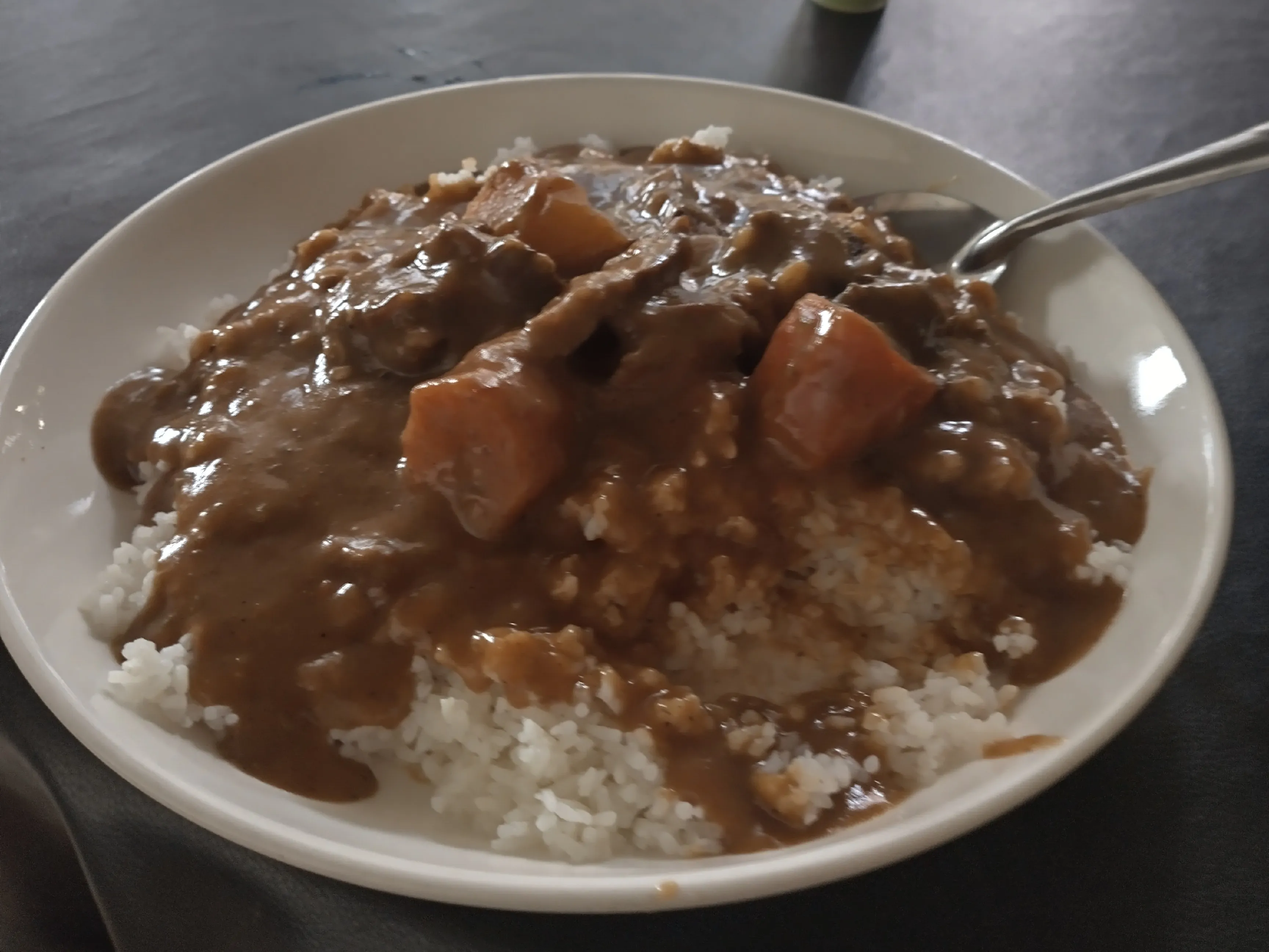 A plate of mafe — a rich peanut and beef stew
