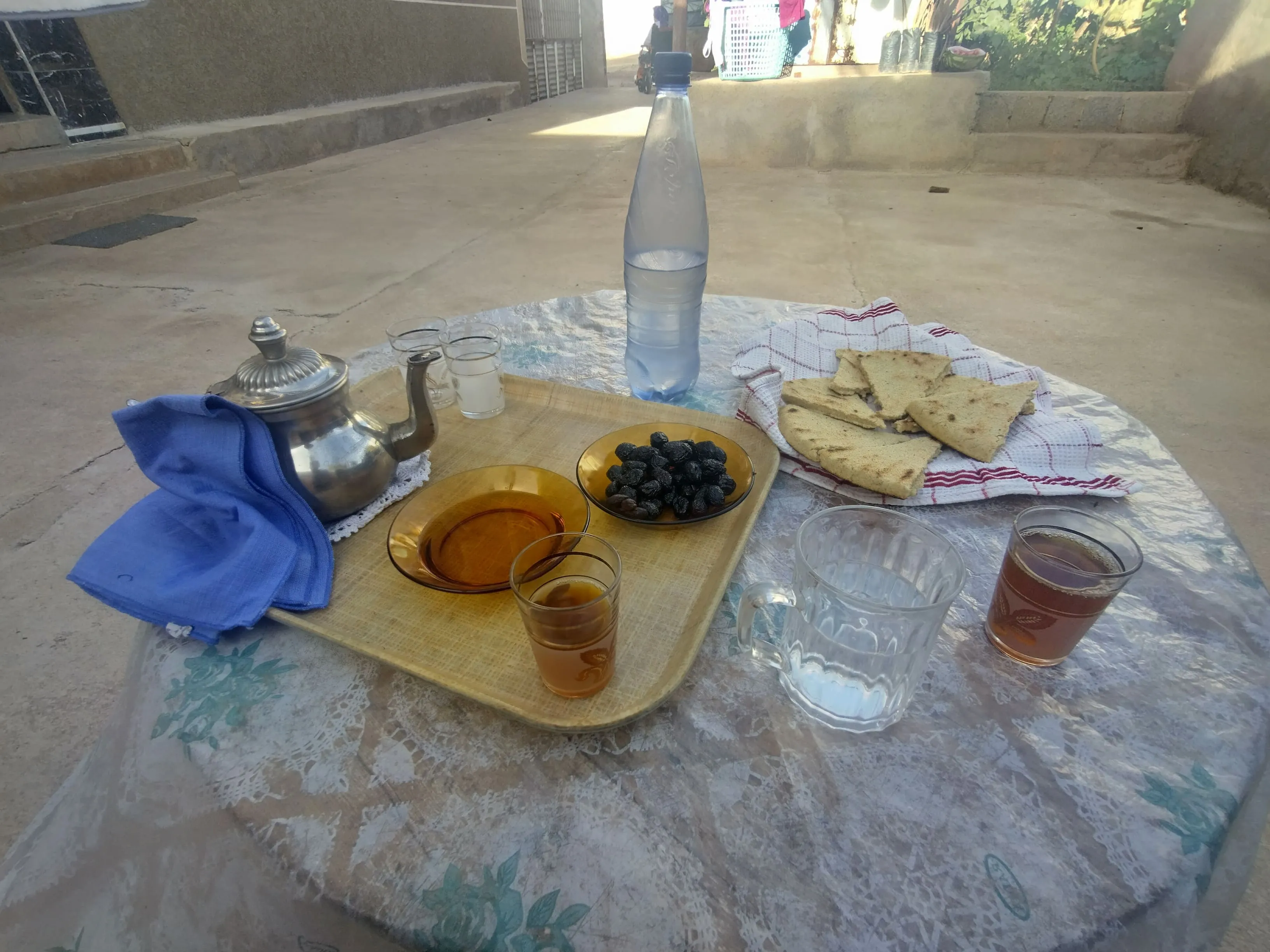 Moroccan bread served with tea, olives and olive oil